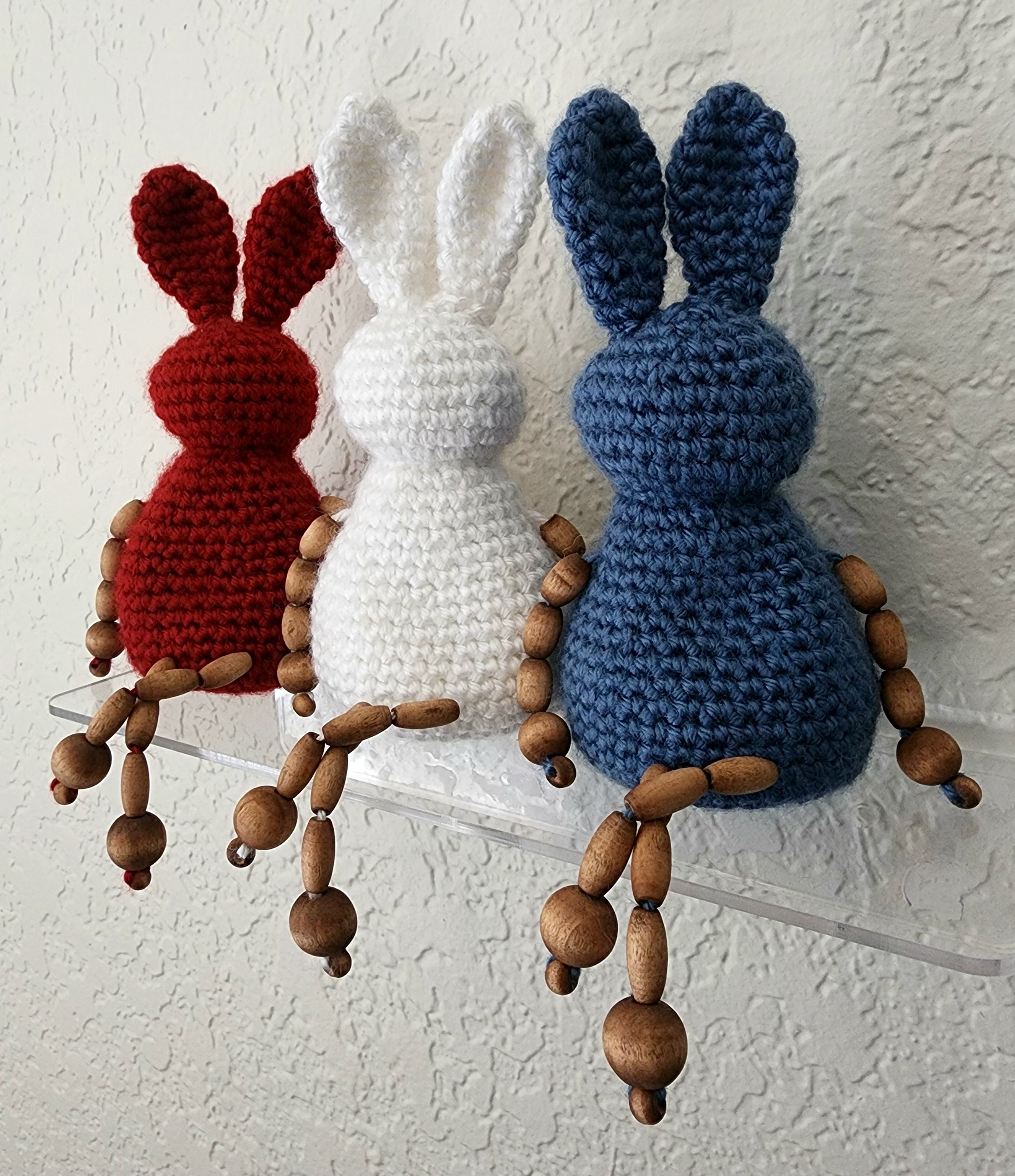 Red, white and blue beaded bunny trio