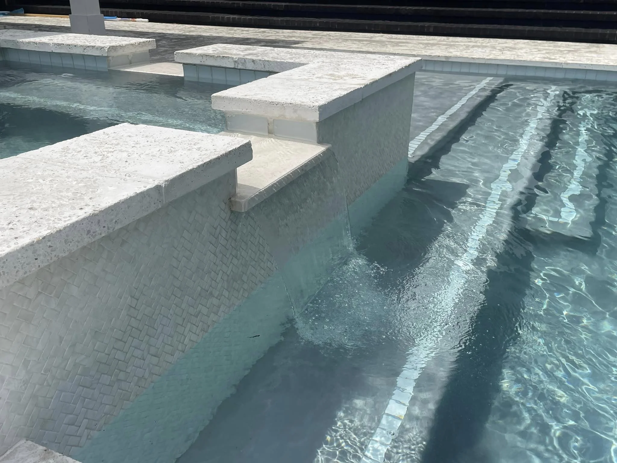 Designed for relaxed, coastal living, this pool brings together soft textures, smooth water flow, and a layout perfect for unwinding with family and friends.