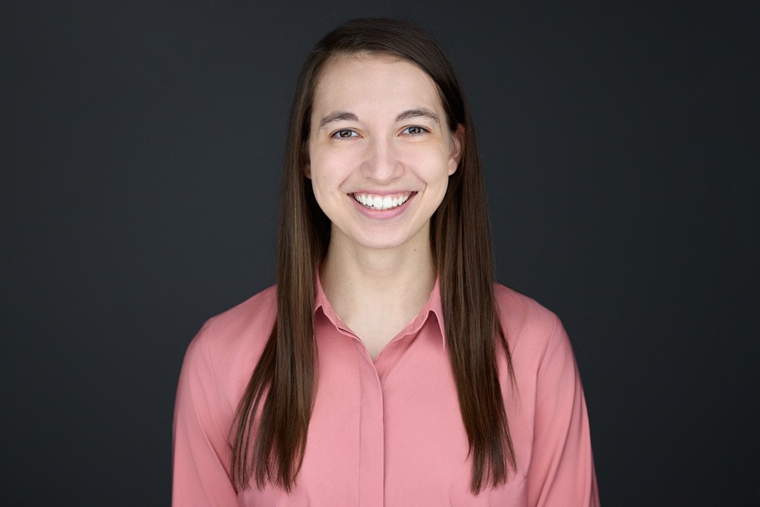 Headshot of a female nursing student wearing a pink shirt