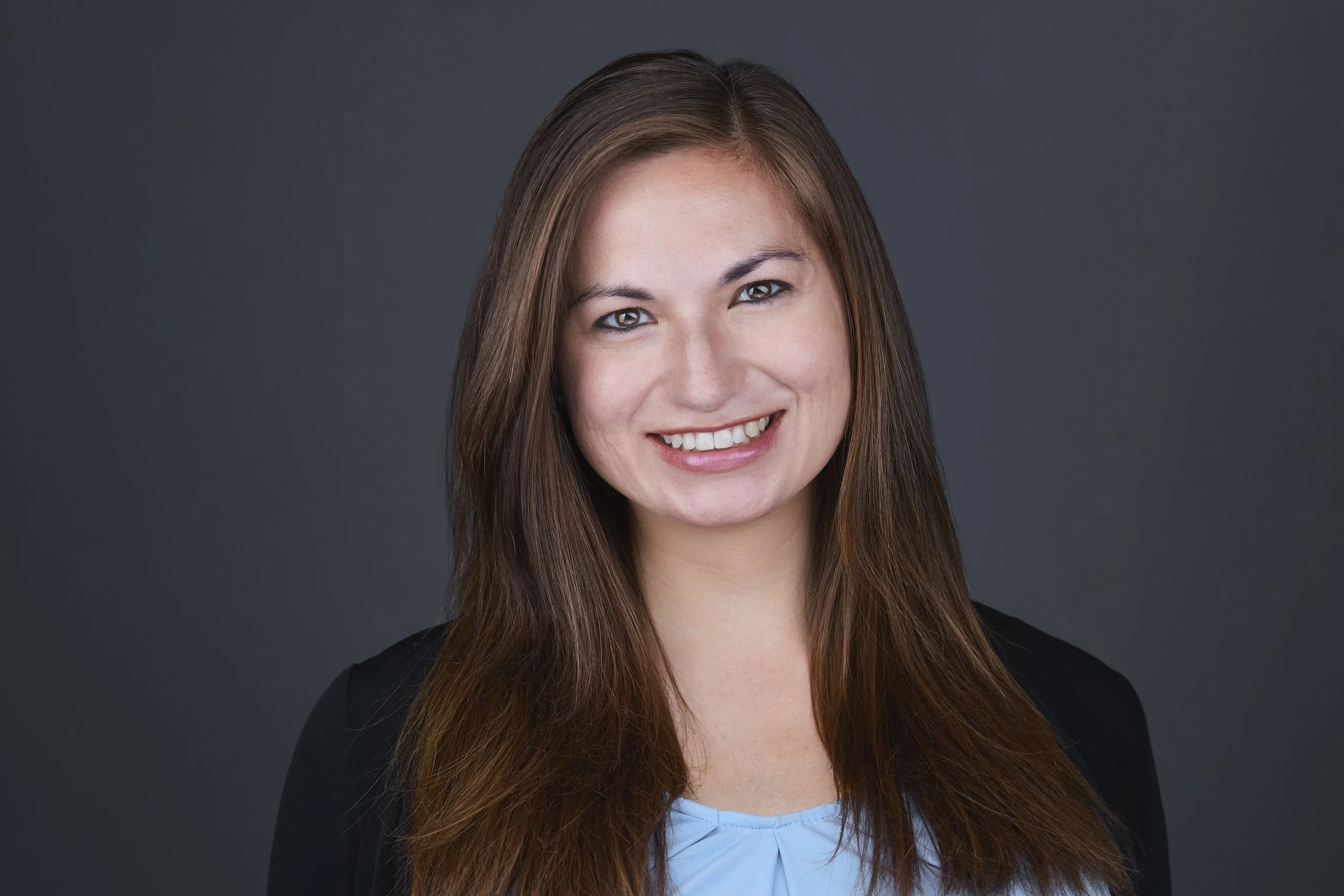 professional headshot of a woman who was able to relax during her headshot session