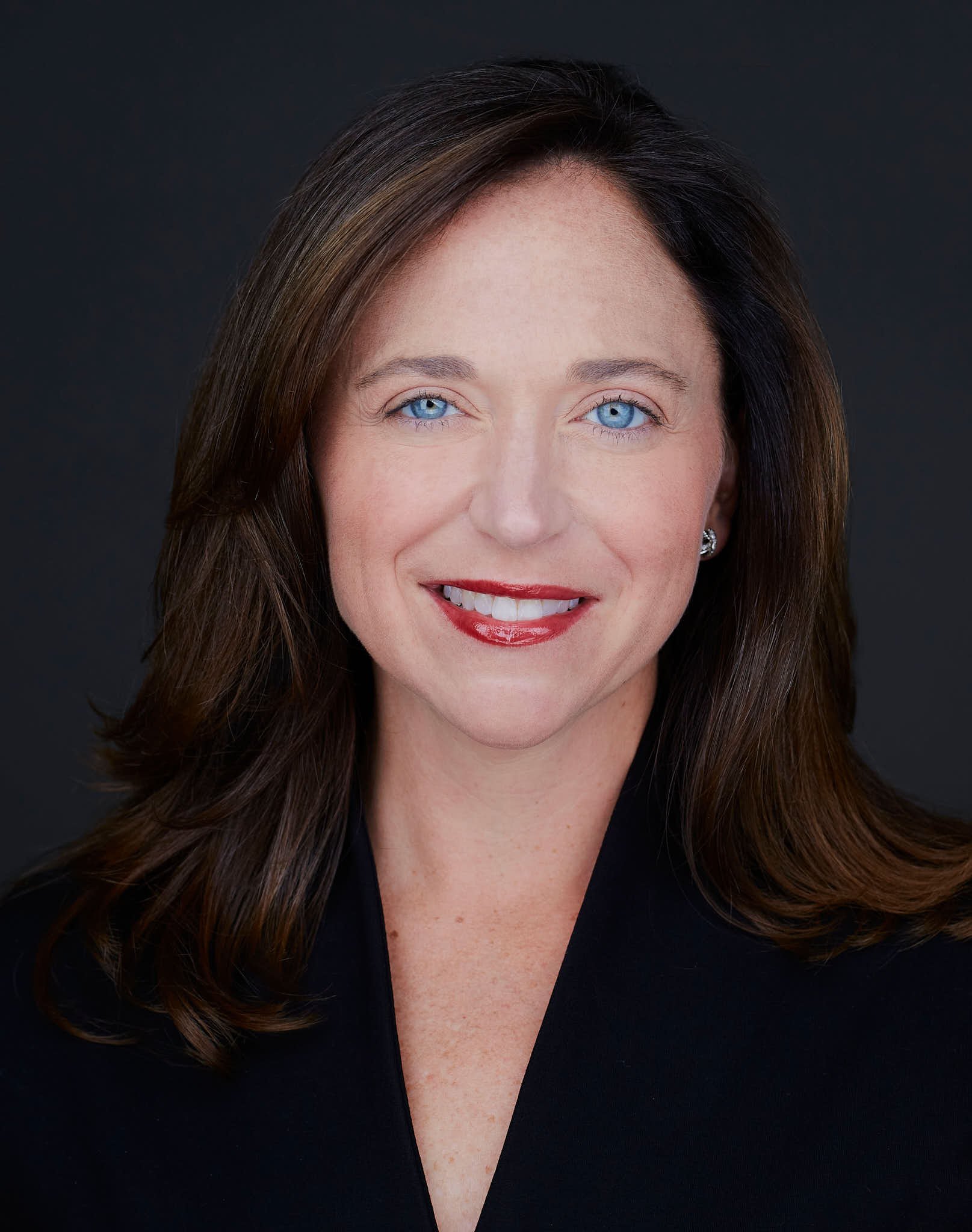 Headshot of a female real estate agent