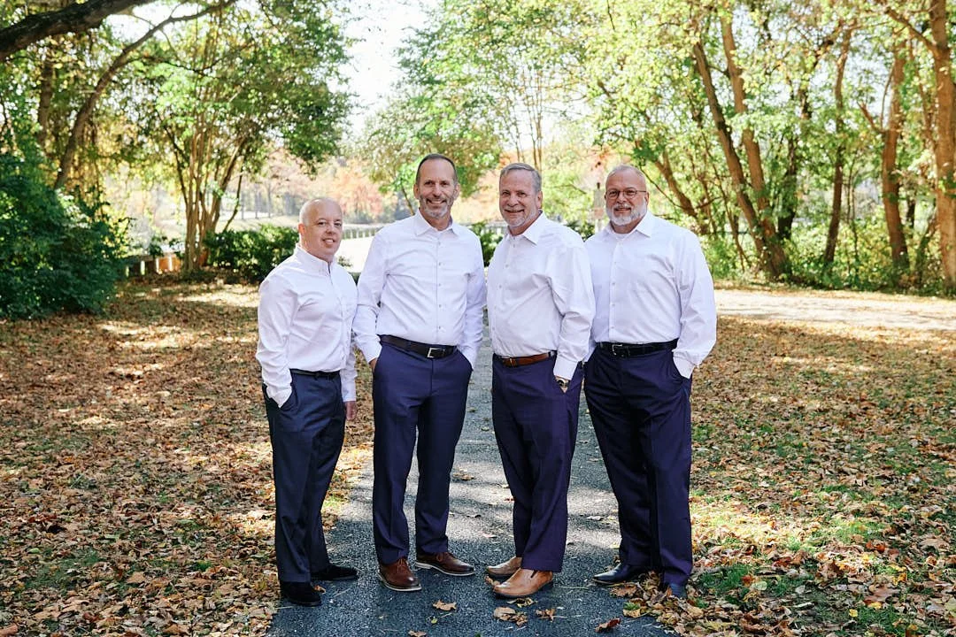 Team portrait of the Prigal brothers real estate agents in Gaithersburg Md