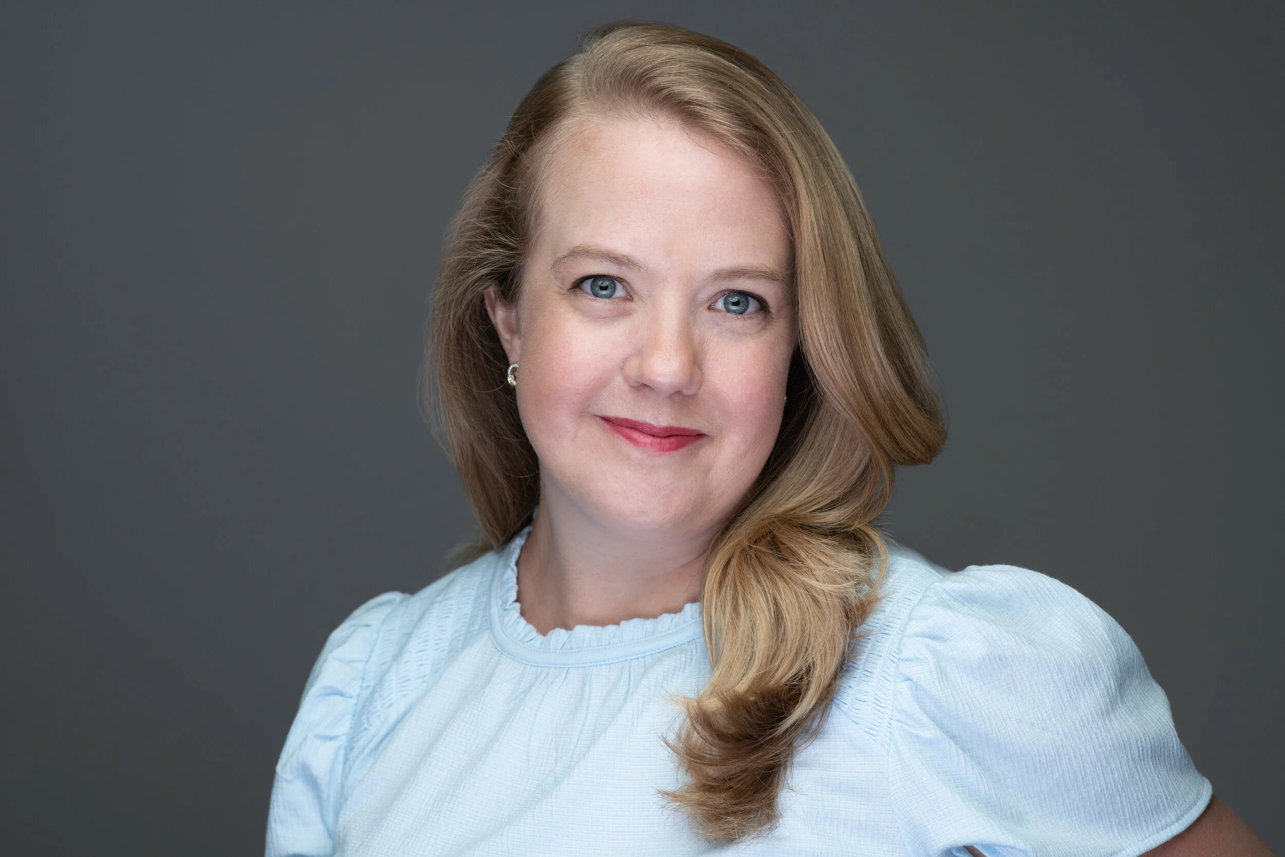 Corporate Headshot of Heather