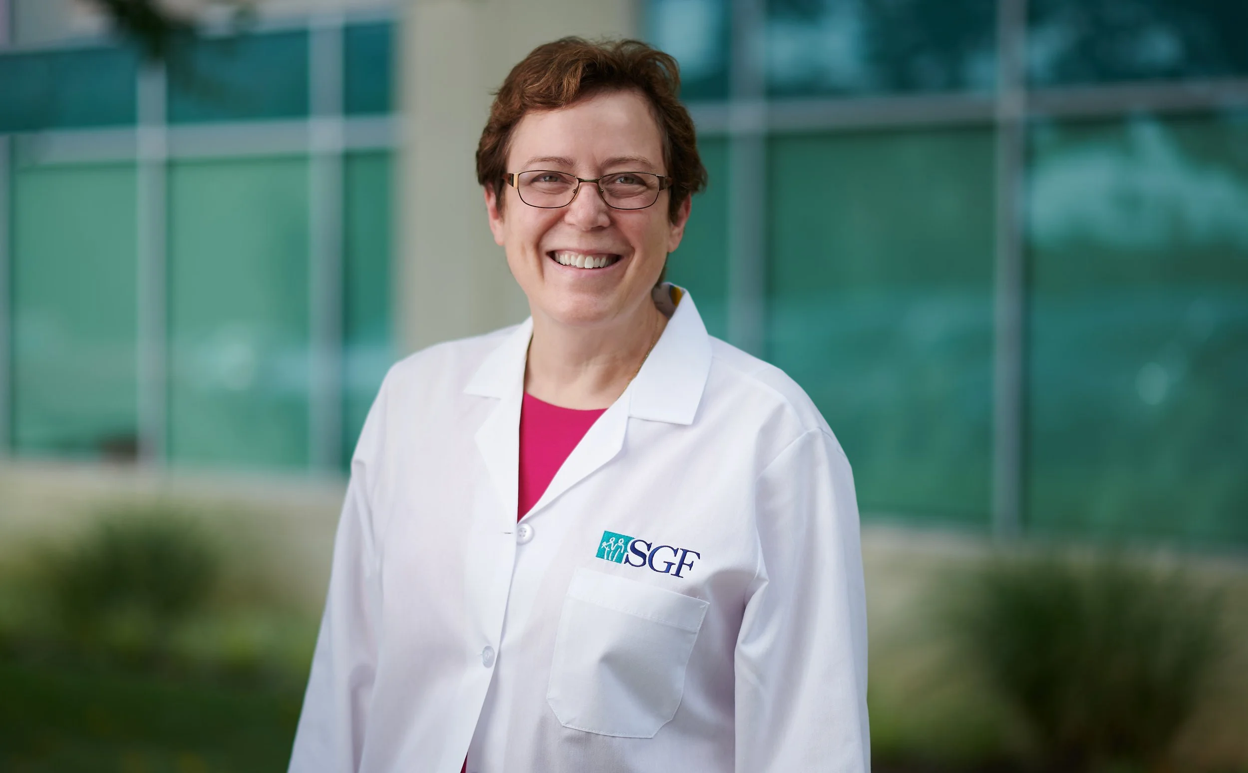 Professional headshot taken on-location at a medical office in Rockville, Maryland by John Armato