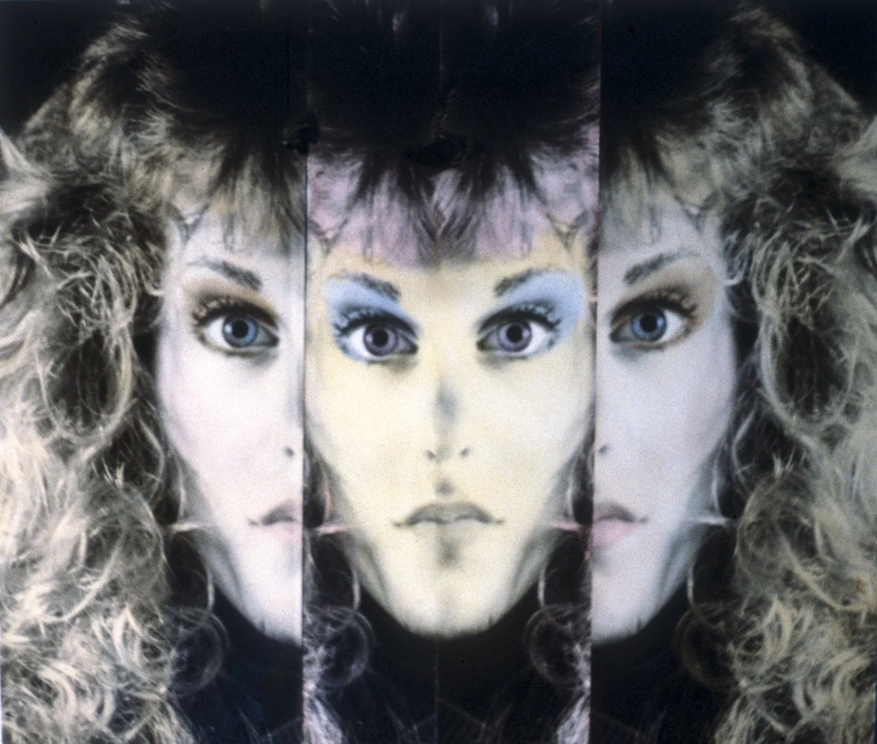 One of my first self-portraits-it is a single side of my face repeated, hand tinted. 
"The Yvonne in Me"