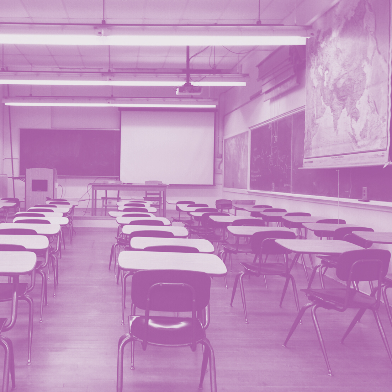Empty classroom with rows of desks and chairs, blackboards, and a projected screen, with purple overlay.