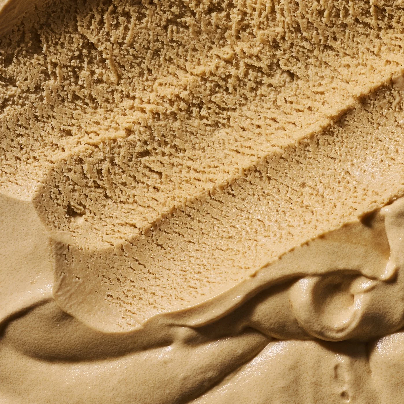 260507_GhiradelliCookbook_ChapterOpener_WhiteChocolateCaramelIceCream_15451_scooped.jpg
