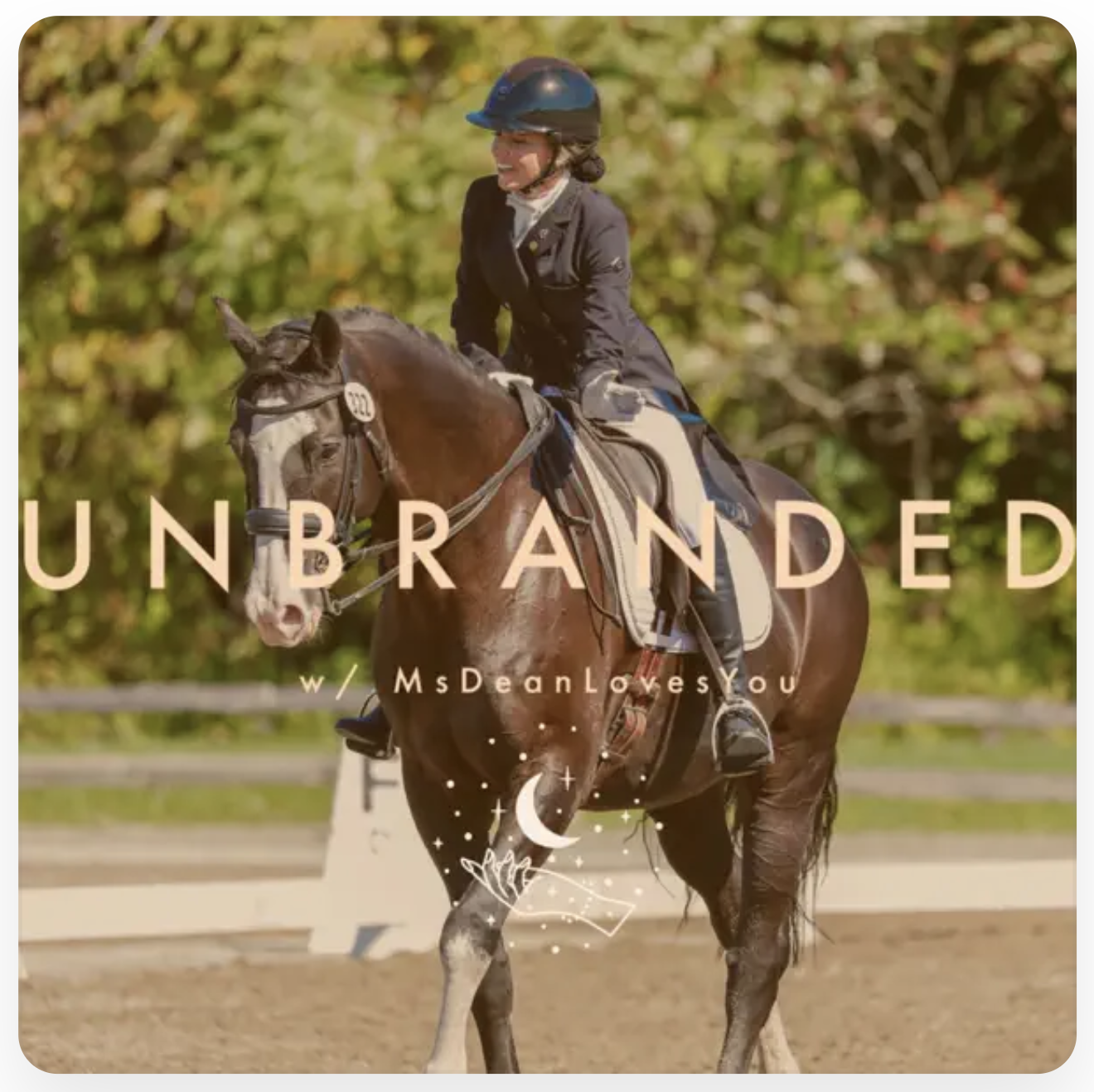 A woman riding a horse in a riding arena with green trees in the background, wearing a black riding outfit and helmet, with the word 'Unbranded' overlayed on the image.