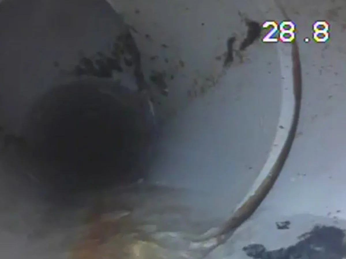 Sewer camera view inside a residential drainpipe during an inspection by Hiawatha Sewer.