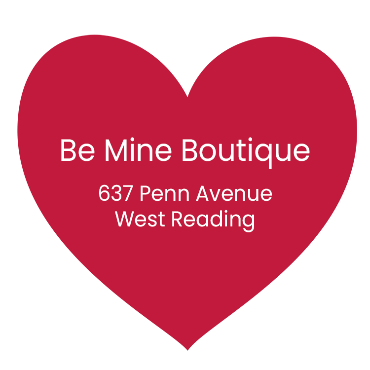A large red heart graphic with white text that reads, "Be Mine Boutique, 637 Penn Avenue, West Reading."