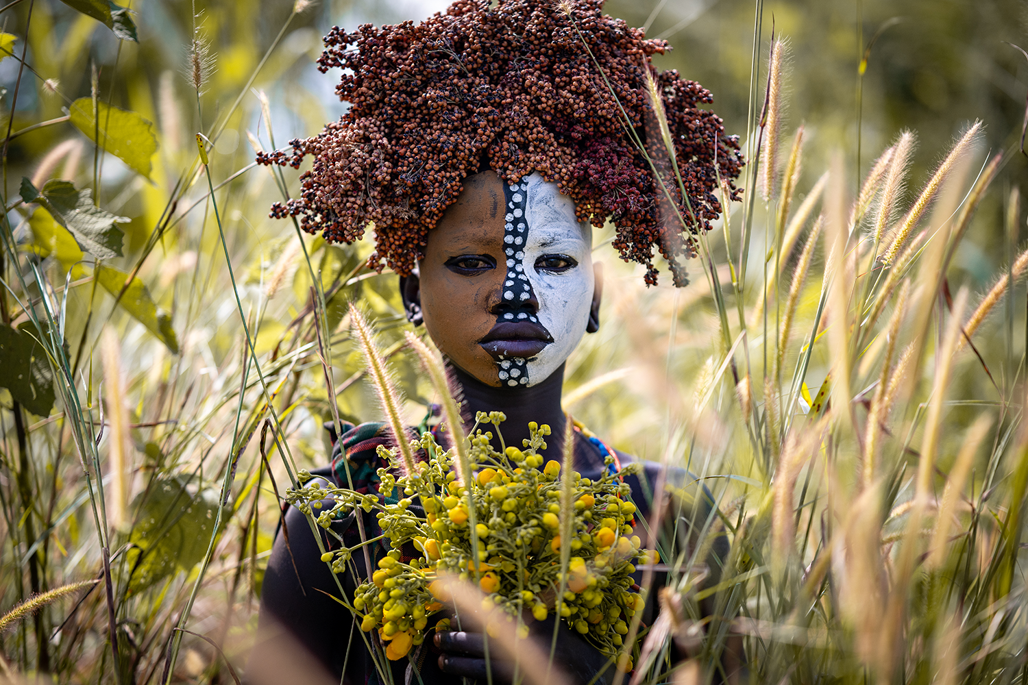Photograph by Terry Divyak of a Suri Woman in Ethiopia, available at Caravan Gallery in La Conner, WA