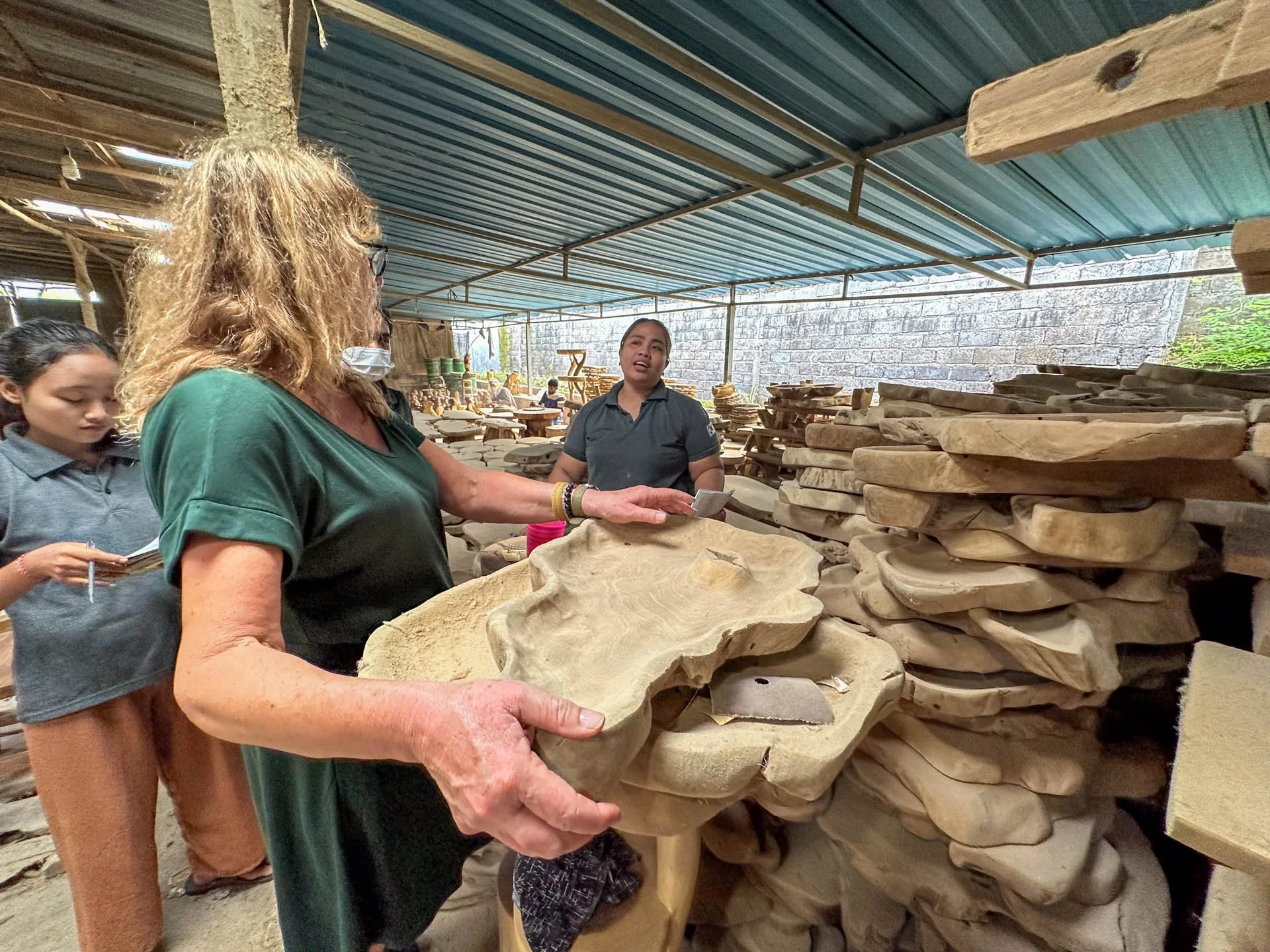 Caravan Gallery in La Conner, WA - Owner Linda purchasing wood products in Bali 