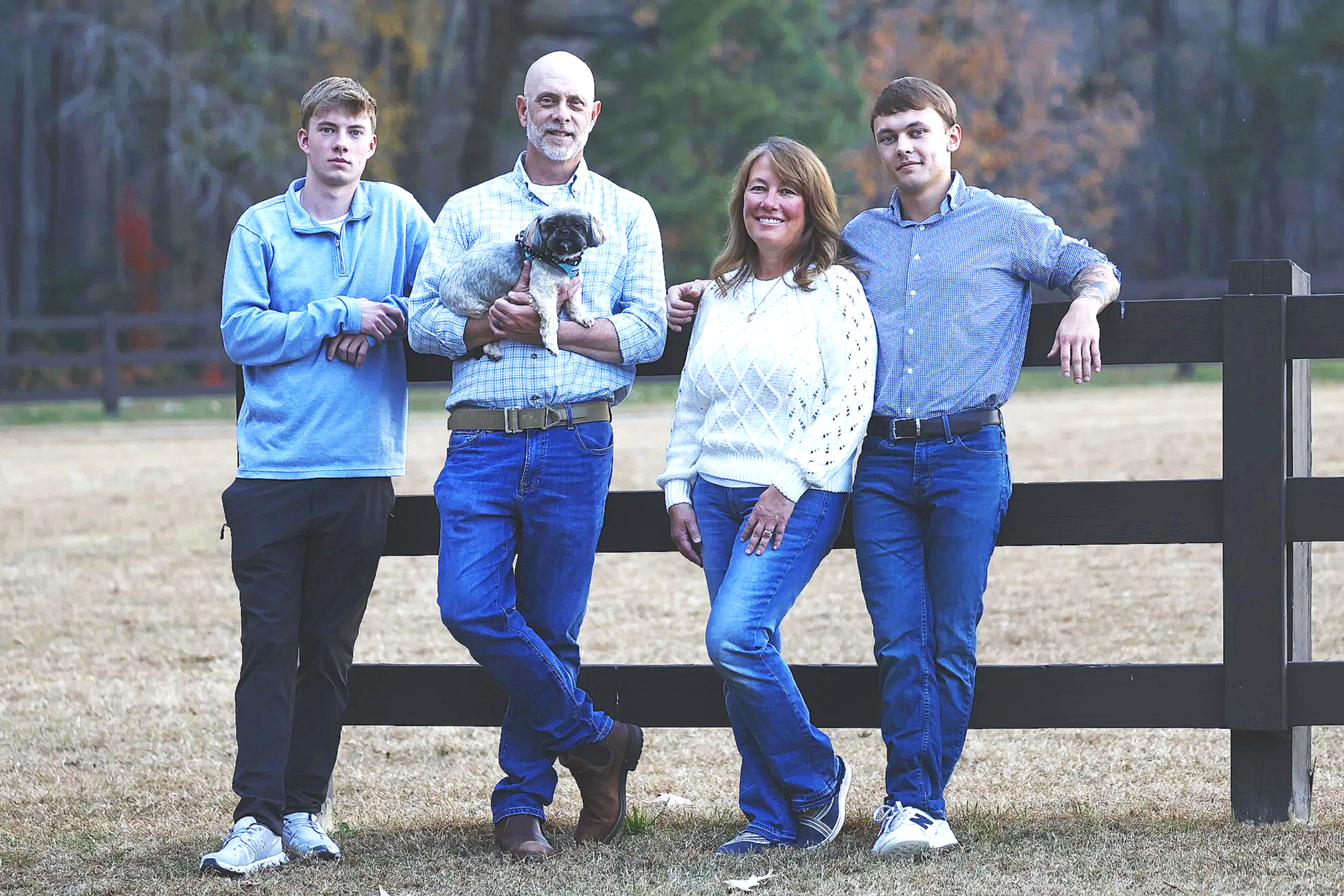 Margie with her husband, Fred, their two sons, and their dog, Lucky.