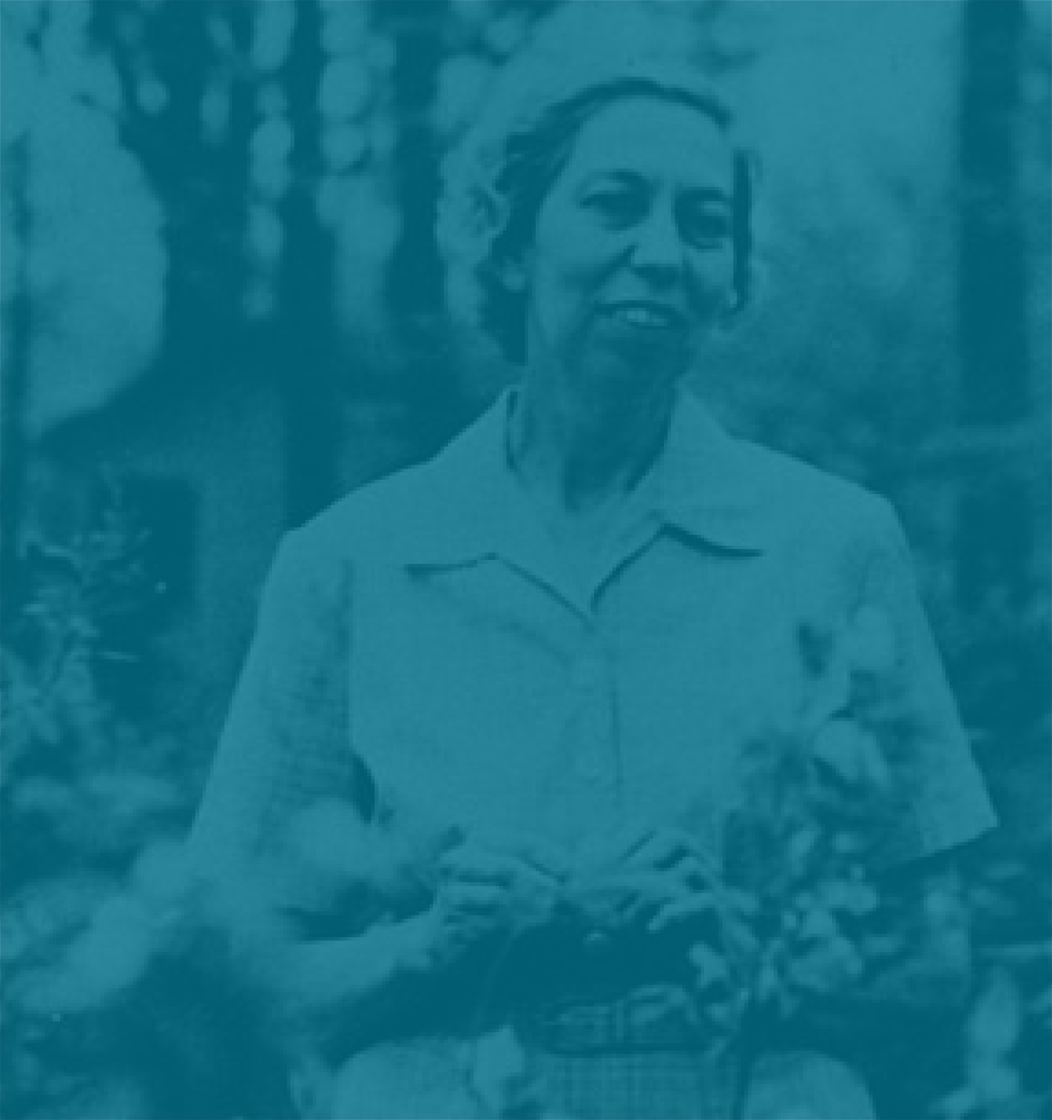 An elderly woman with short, curly hair, smiling, outdoors in a park or garden.