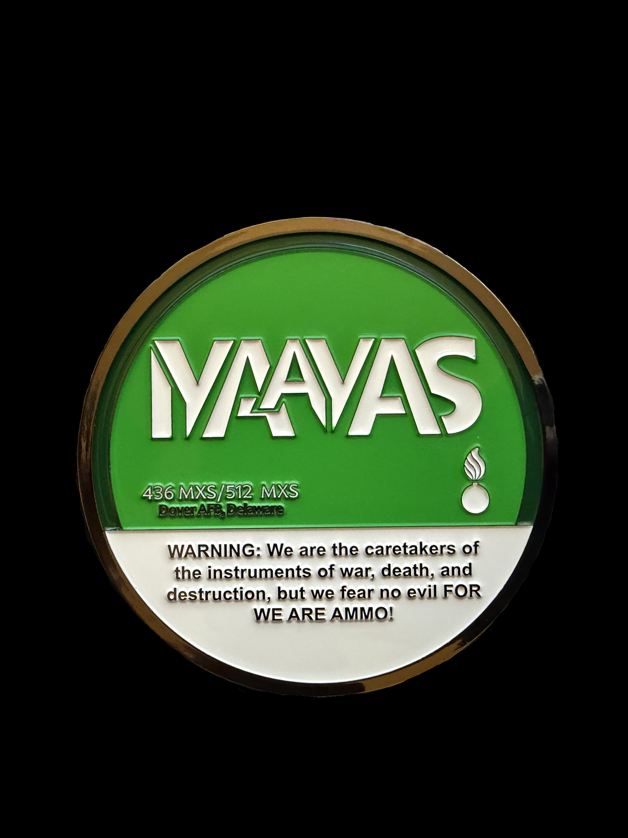 A circular green and white label for MYYAS ammunition, displaying caliber sizes 436 MXS and 512 MXS, and the location Dover AFB, Delaware. The label features a warning about being caretakers of instruments of war, death, and destruction, but states they fear no evil for they are ammunition.