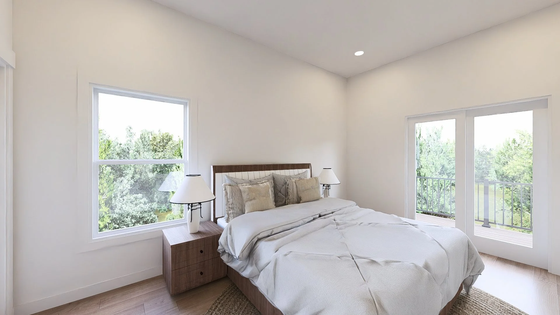 A bright bedroom with a large bed, wooden headboard, white bedding, and multiple pillows. There are two matching nightstands with white lamps on each side of the bed. The room has large windows and a sliding glass door that lead to a balcony, showing