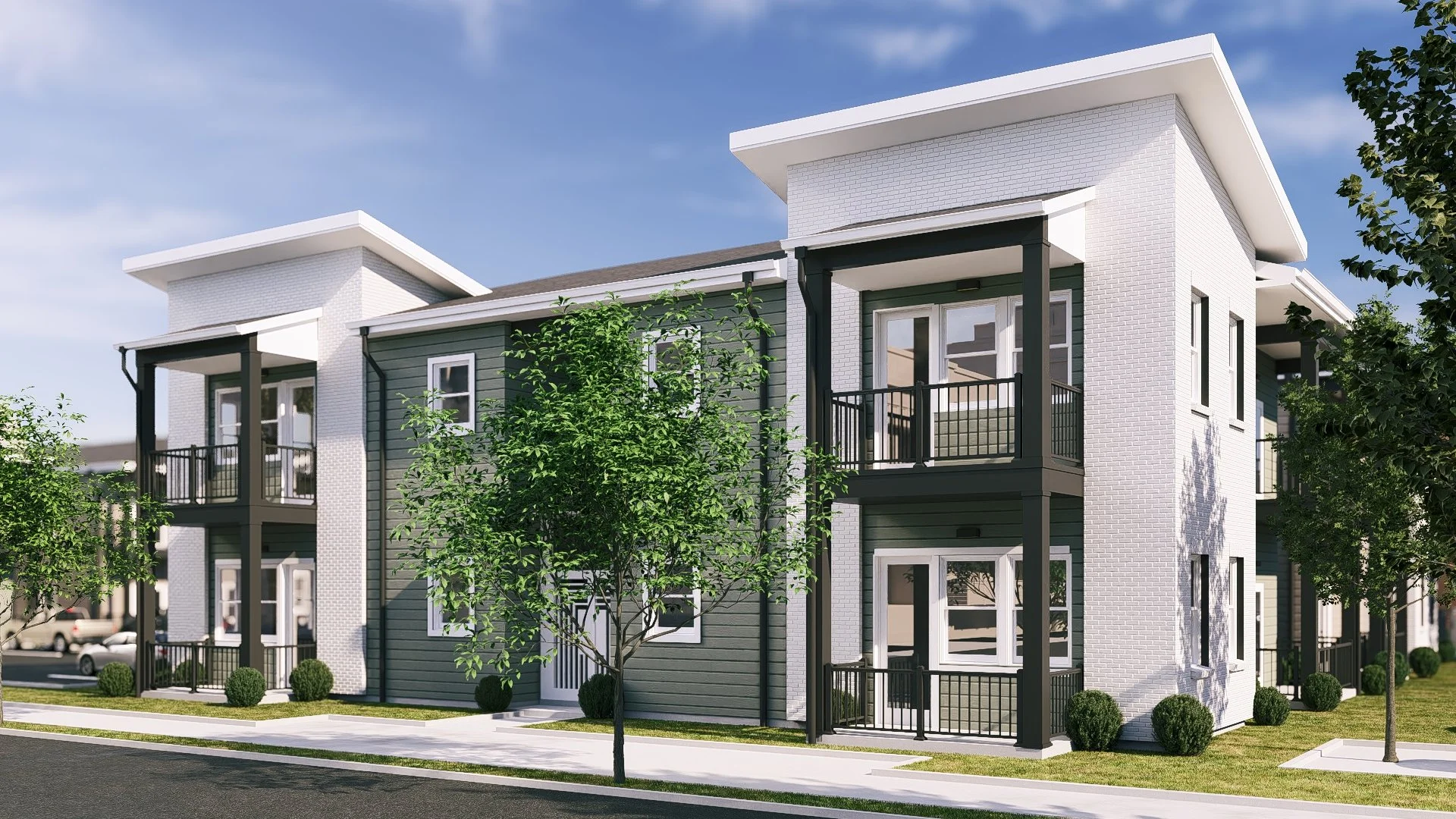 Modern residential building with white and gray exterior, small balconies, surrounded by trees and a well-maintained lawn, under a blue sky.