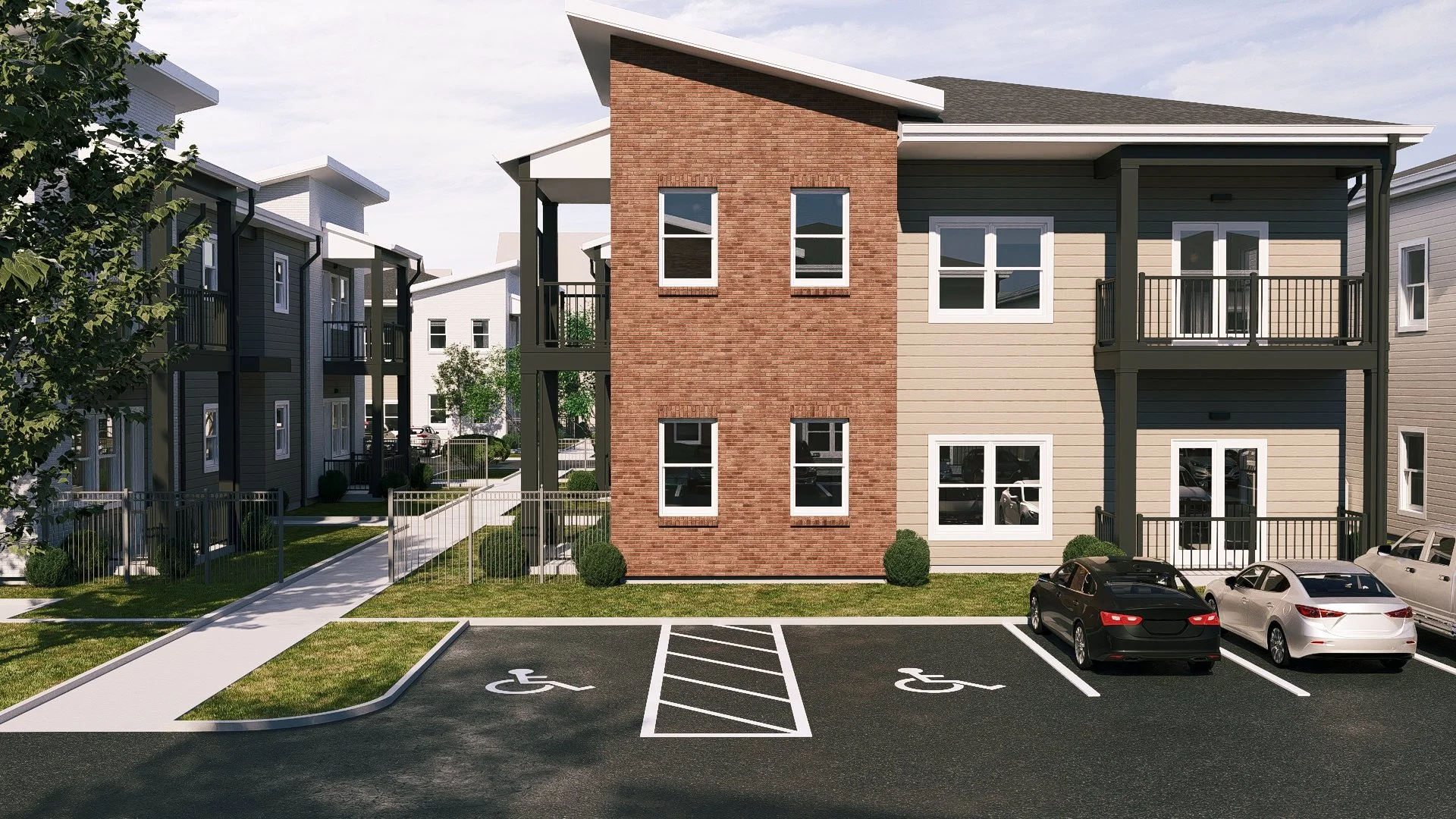 Apartment complex with parking lot, including designated handicap spaces, outdoor walkways, and balconies.