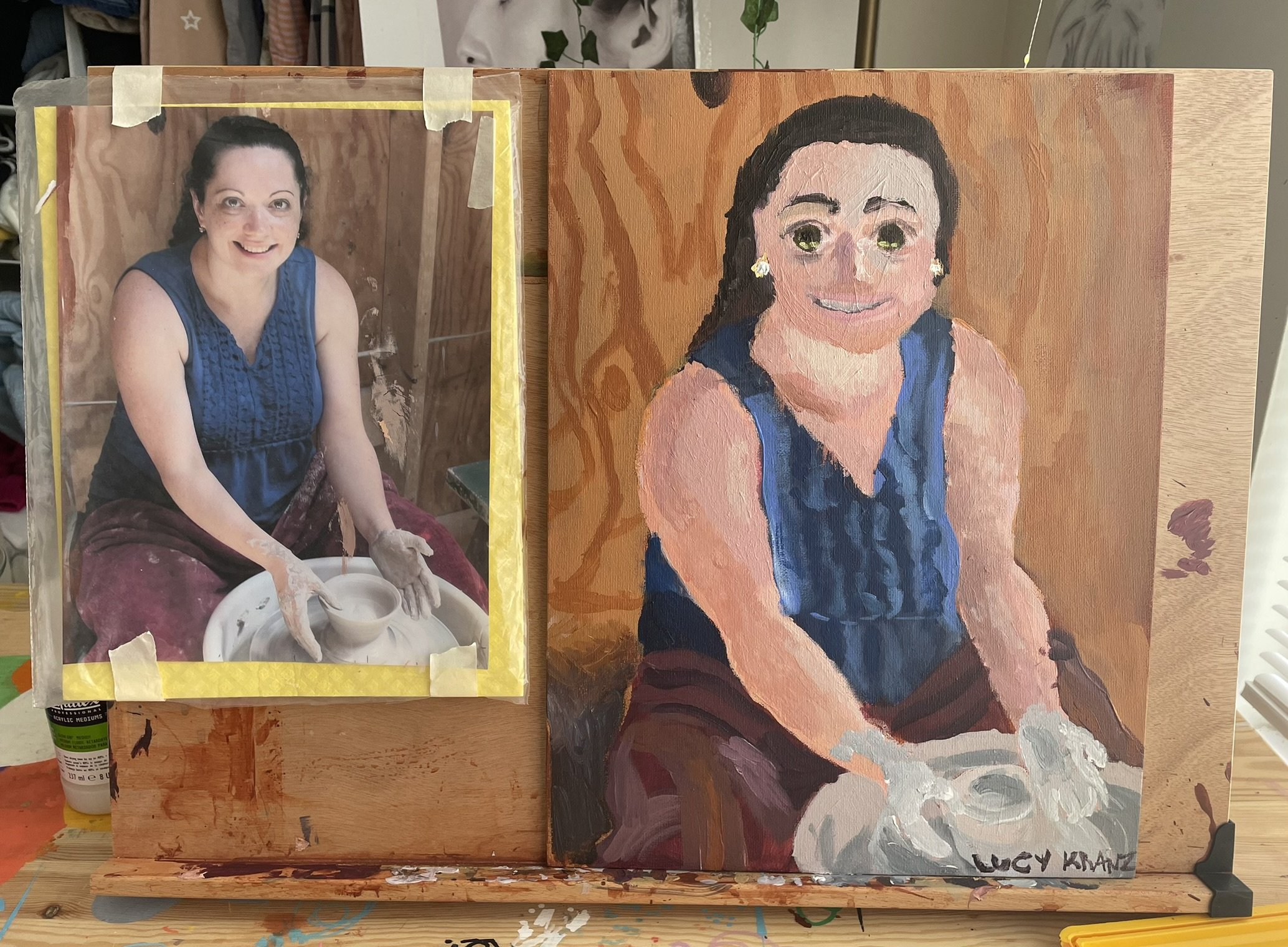 A side-by-side display of a photograph and a painted portrait of a woman. The photograph shows her smiling while working on pottery, wearing a blue sleeveless top, and covered in clay. The painted portrait depicts her seated, smiling, with a similar 