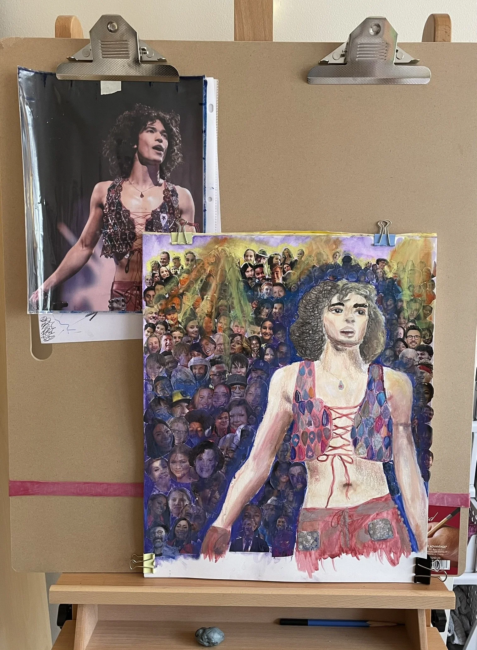 A mixed media artwork featuring a collage of numerous portraits of a woman with curly hair in the background, and a painted portrait of the same woman in the foreground wearing a colorful vest and shorts. The collage includes photographs of various p