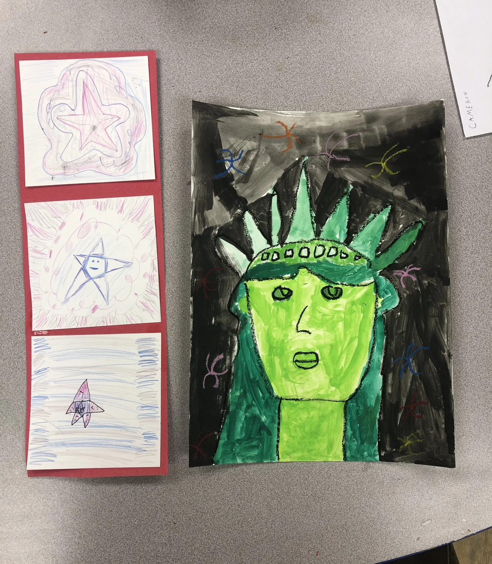Colored drawing of a person with green skin and green hair styled like the Statue of Liberty, set against a dark background with colorful abstract figures around.