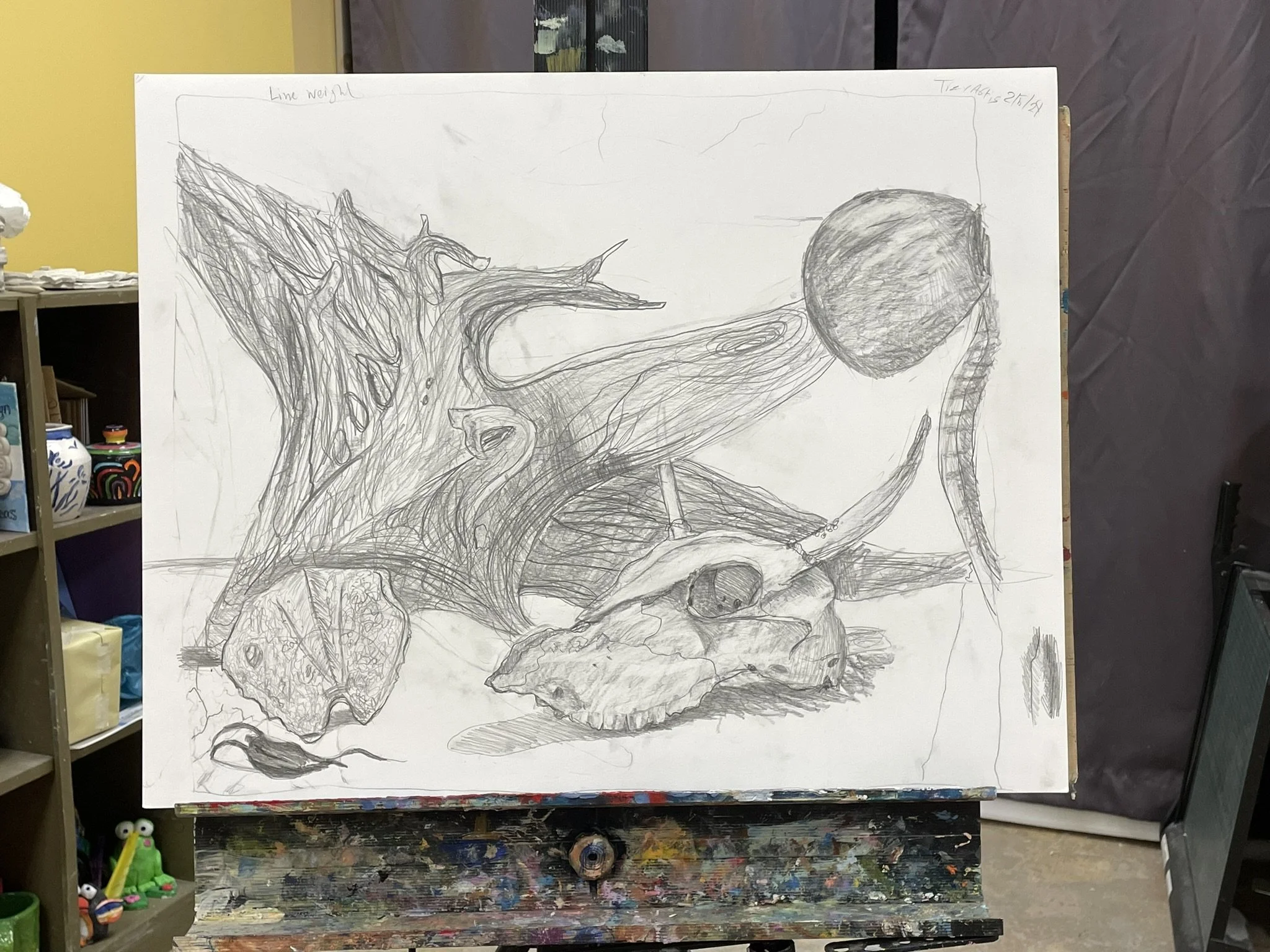 A detailed pencil sketch of a tree stump with animal skulls, a snake, and a round object, possibly a ball, in a still life composition.