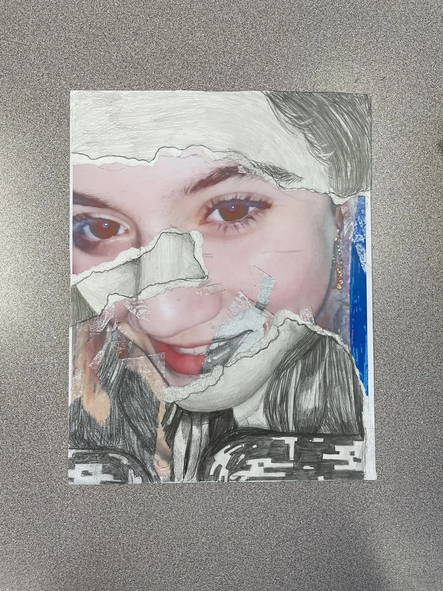 A mixed-media collage combining a photograph of a woman's face with torn paper and pencil sketch elements, creating a layered artistic representation.
