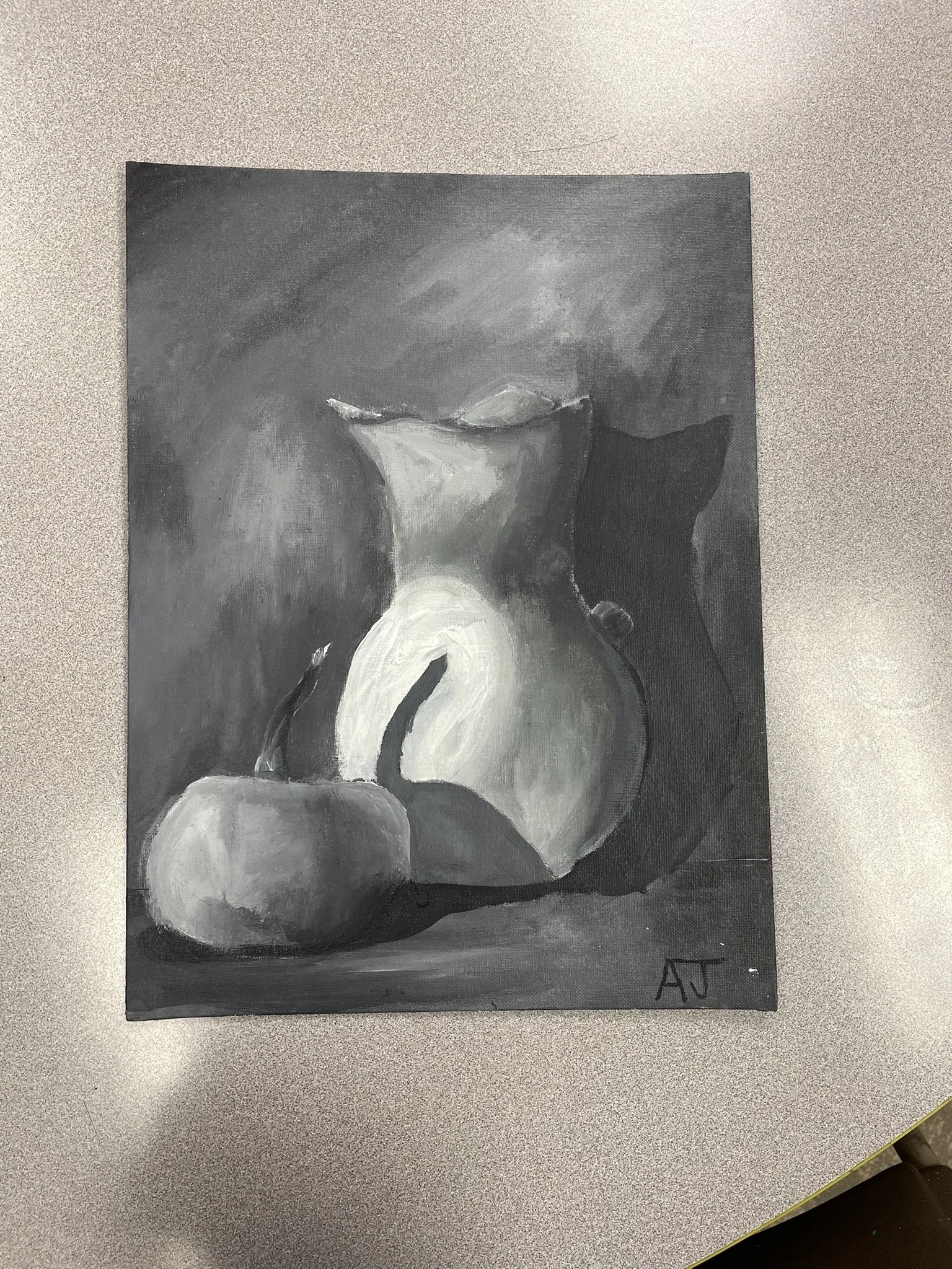 Black and white still life painting of a pitcher and two fruits, one round and the other elongated, casting shadows on a surface.