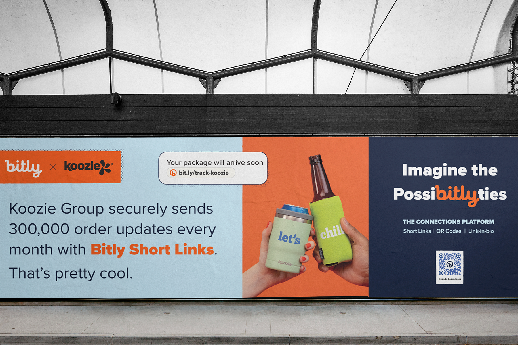 An advertisement on a wall promoting Koozie Group's Bitly Short Links, featuring the phrase 'Imagine the Possibilities' and a QR code for more information, with images of hands holding beverage koozies and bottles.