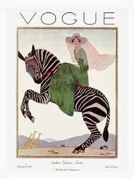 Vogue magazine cover featuring a woman riding a zebra in a green dress and pink hat.