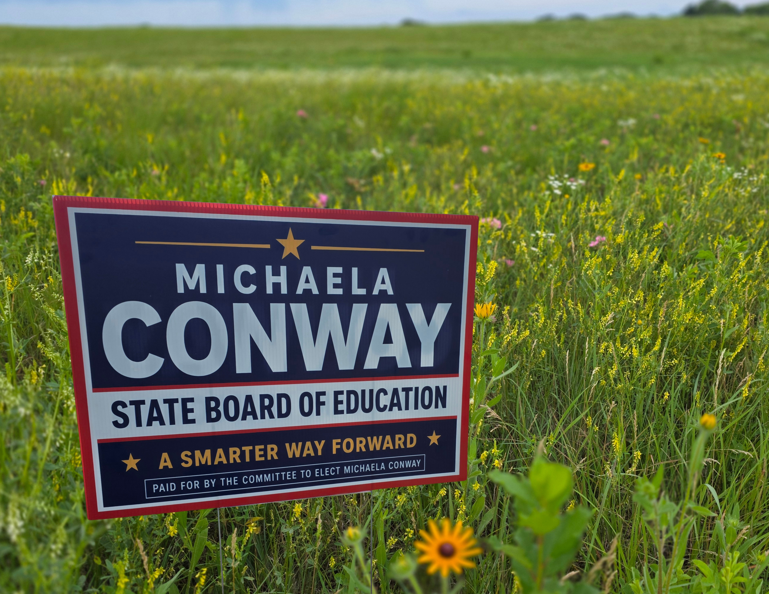 photo of  Michaela Conway yard sign in a meadow