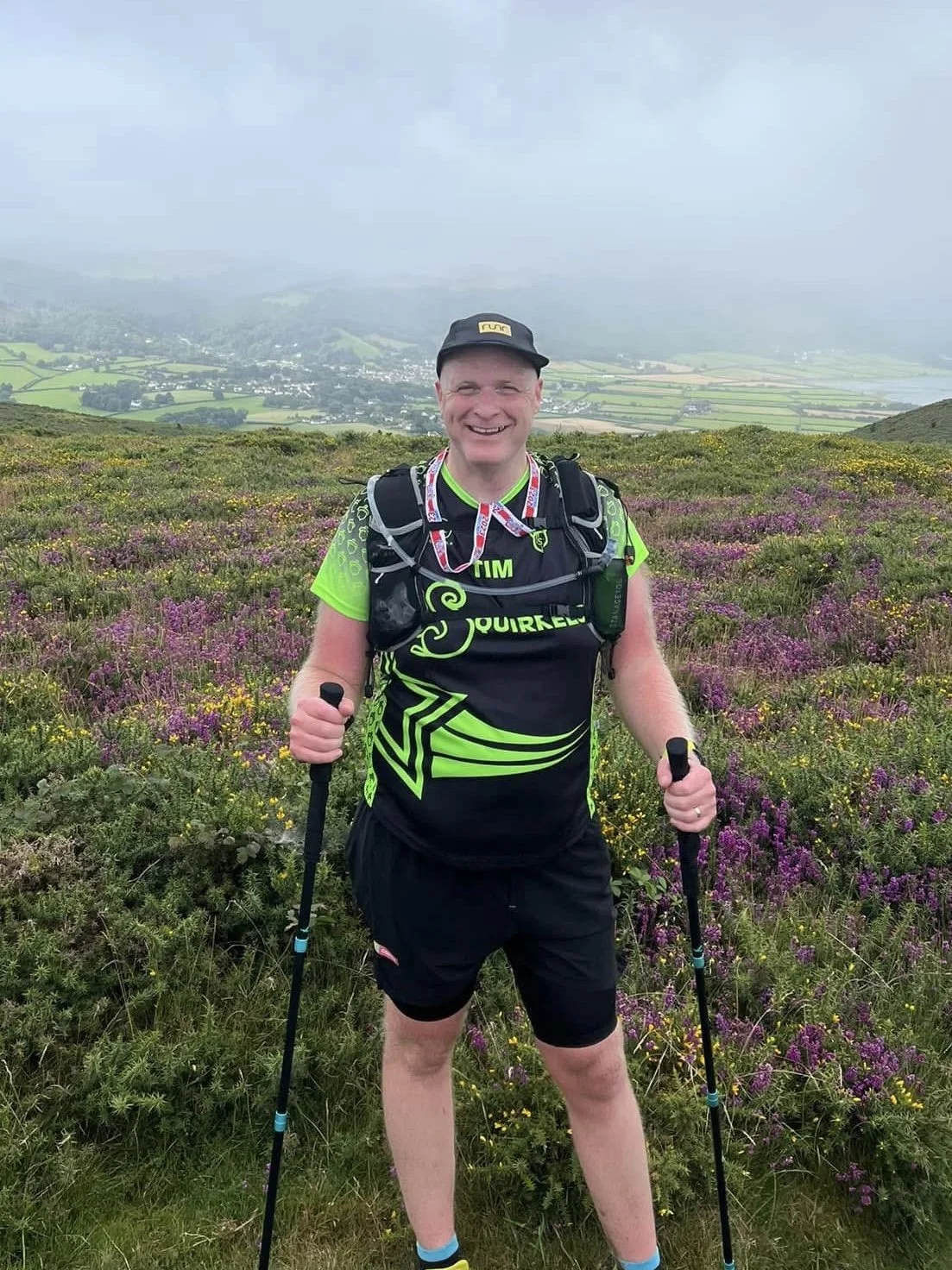 Tim standing on a hill during an ultramarathon