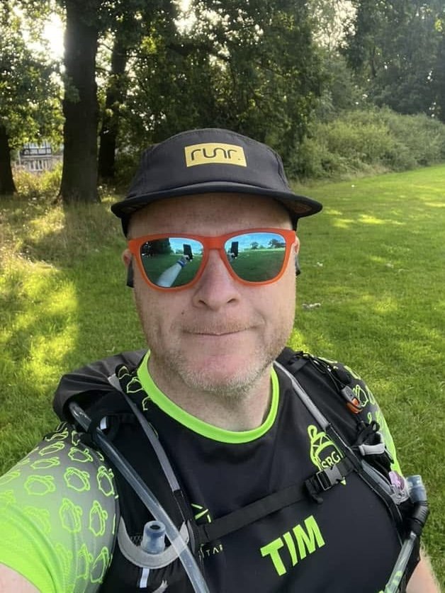 Tim smiling in Braunstone Park just before parkrun