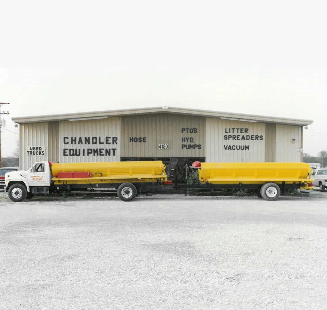 Original Chandler Equipment building; used trucks, hose, pto's, hydraulic pumps, litter spreaders, vacuum accessories