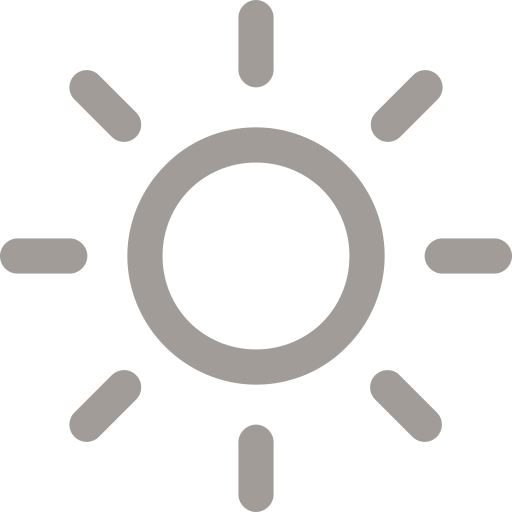 Gray icon of a sun with rays extending outward.