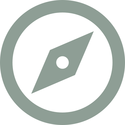 Icon of a compass with a circular border and needle pointing northeast.