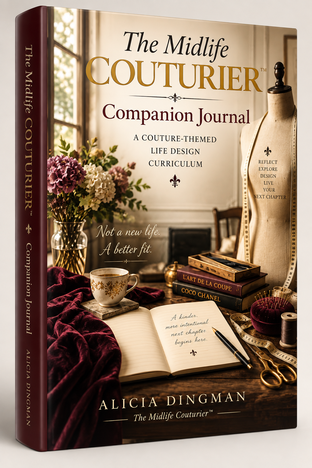 Book cover titled "The Midlife Couturier Companion Journal" featuring a sewing mannequin, a bouquet of flowers, a teacup, an open journal, sewing tools, and fashion books in a vintage-style sewing room