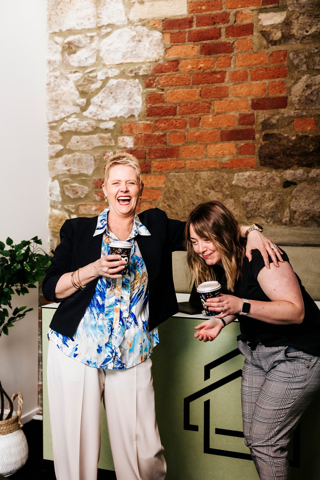 Victoria Robertson HR Consultant Dunedin joking with client in the workplace