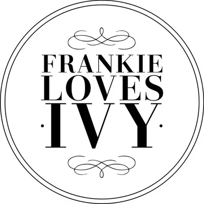 A circular logo with the text "Frankie Loves Ivy" in the center, surrounded by decorative swirls and a double-line border.