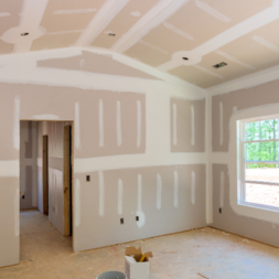 Drywall finishing and taping in a Denver residential home before sanding, texture and paint