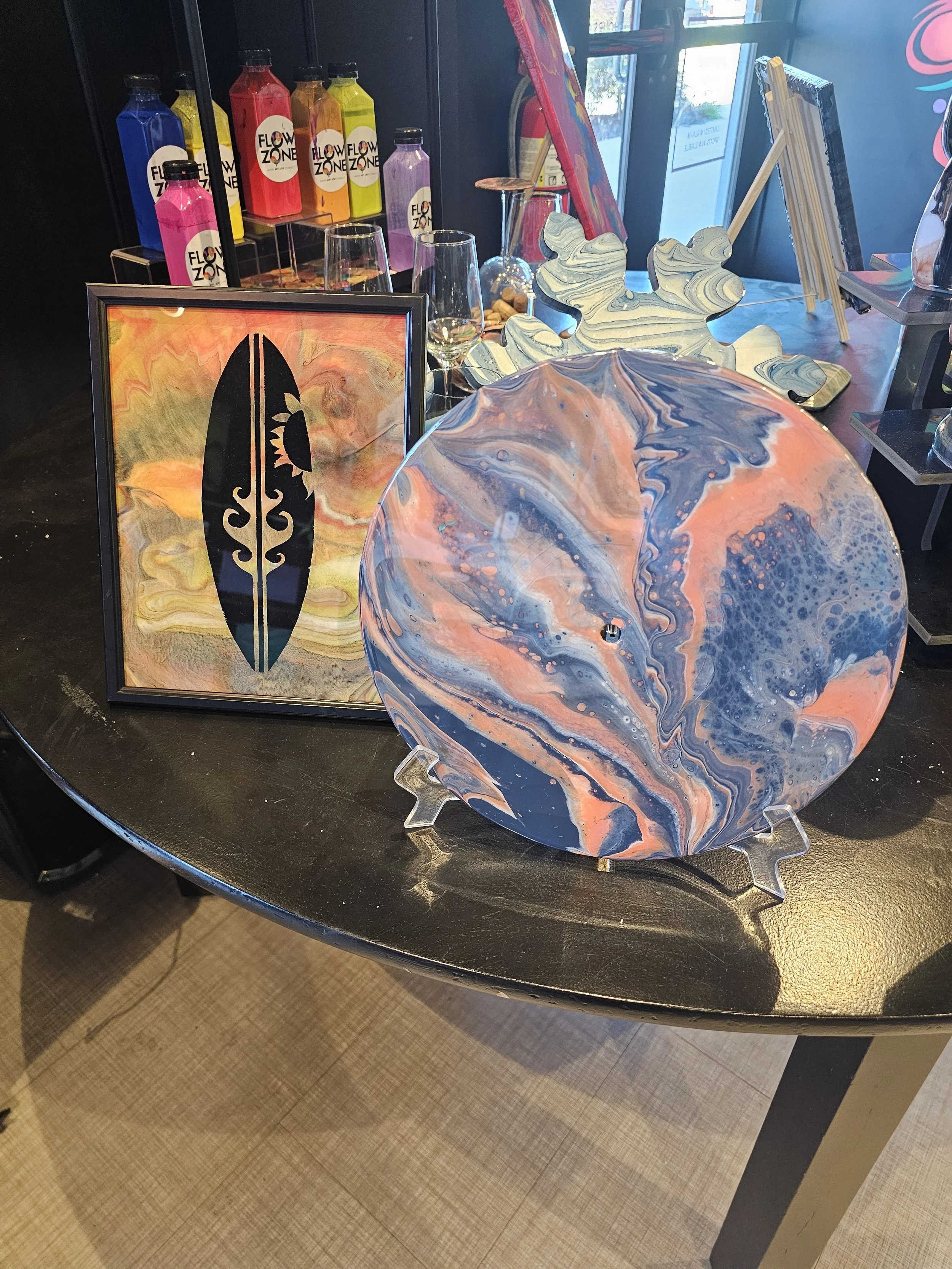 Variety of glass frames, beautiful images painted on glass, acrylic paint poured over image, dimensional, abstract fluid art, abstract paint poured on vinyl record, made in art class in Henrico, VA.
