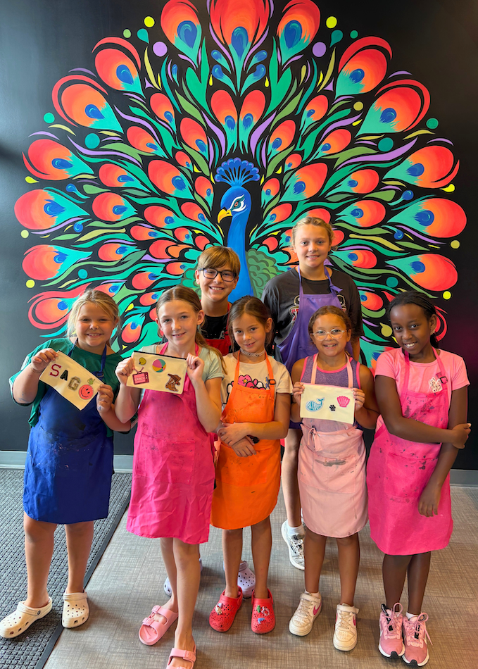 Summer art camp, half-day camp, happy kids, peacock selfie mural, art studio, custom bags, patches, pins, chains, charms