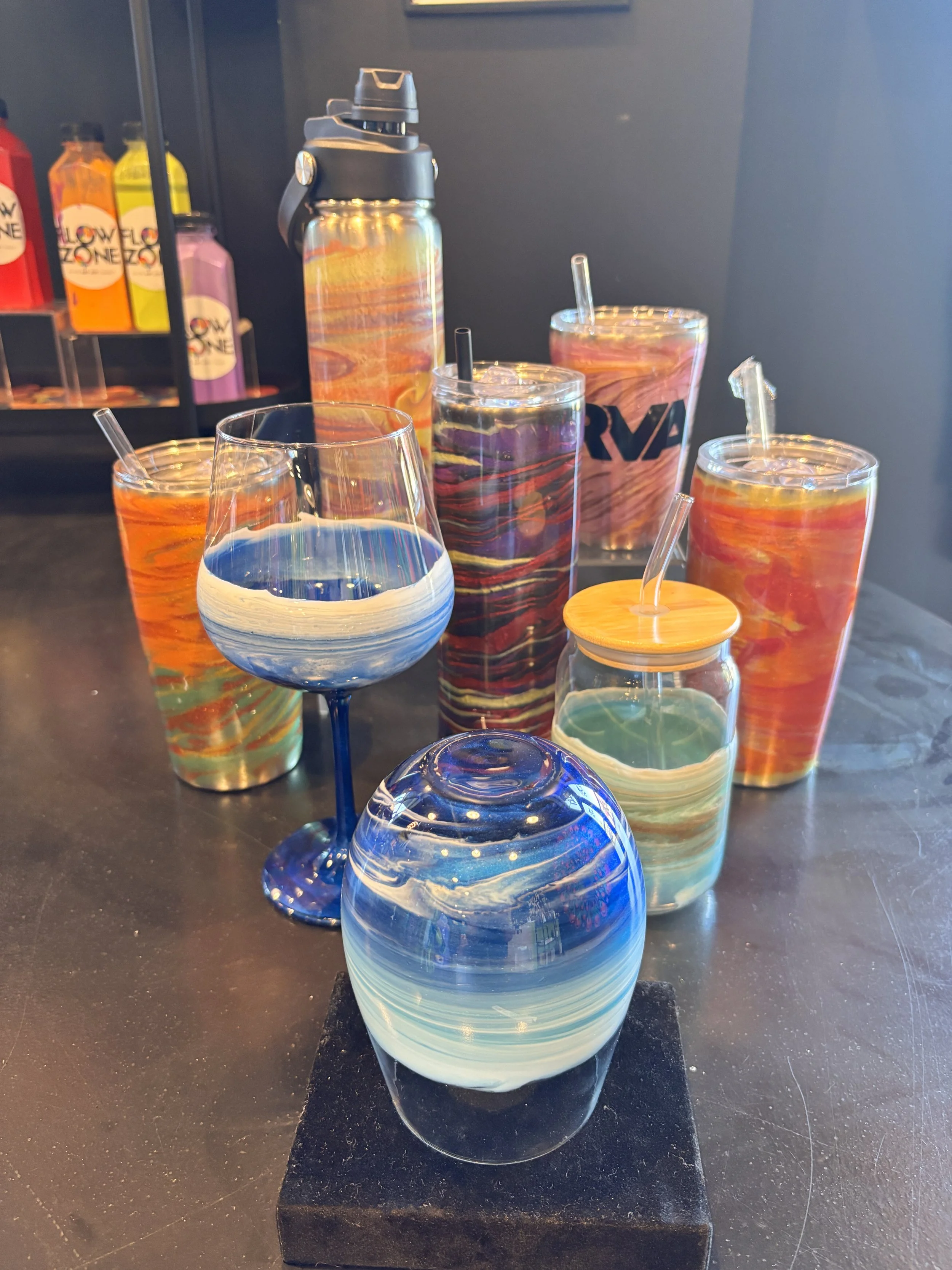 Vibrant colorful resin tumblers, wine glasses, custom straw cups, mica powder, dye, epoxy resin, glossy one-of-a-kind masterpiece. Make custom tumblers and wine glasses in Henrico, VA