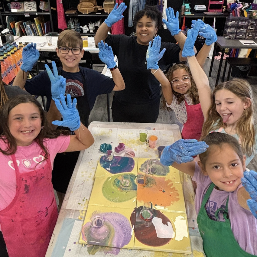 summer art camp, smiling children, half-day camp, acrylic pour painting, canvases, aprons, gloves, happy group