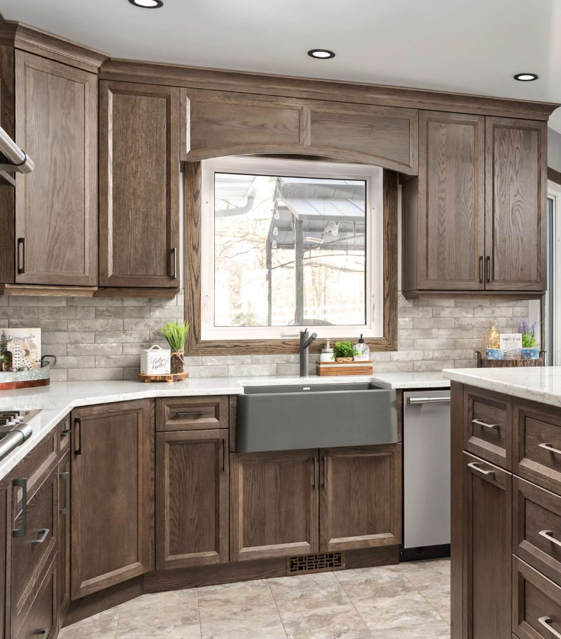 Kitchen with wooden cabinets, a large window above a farmhouse sink, and a gray dish soap bottle on the counter, with neutral tile flooring and recessed lighting.