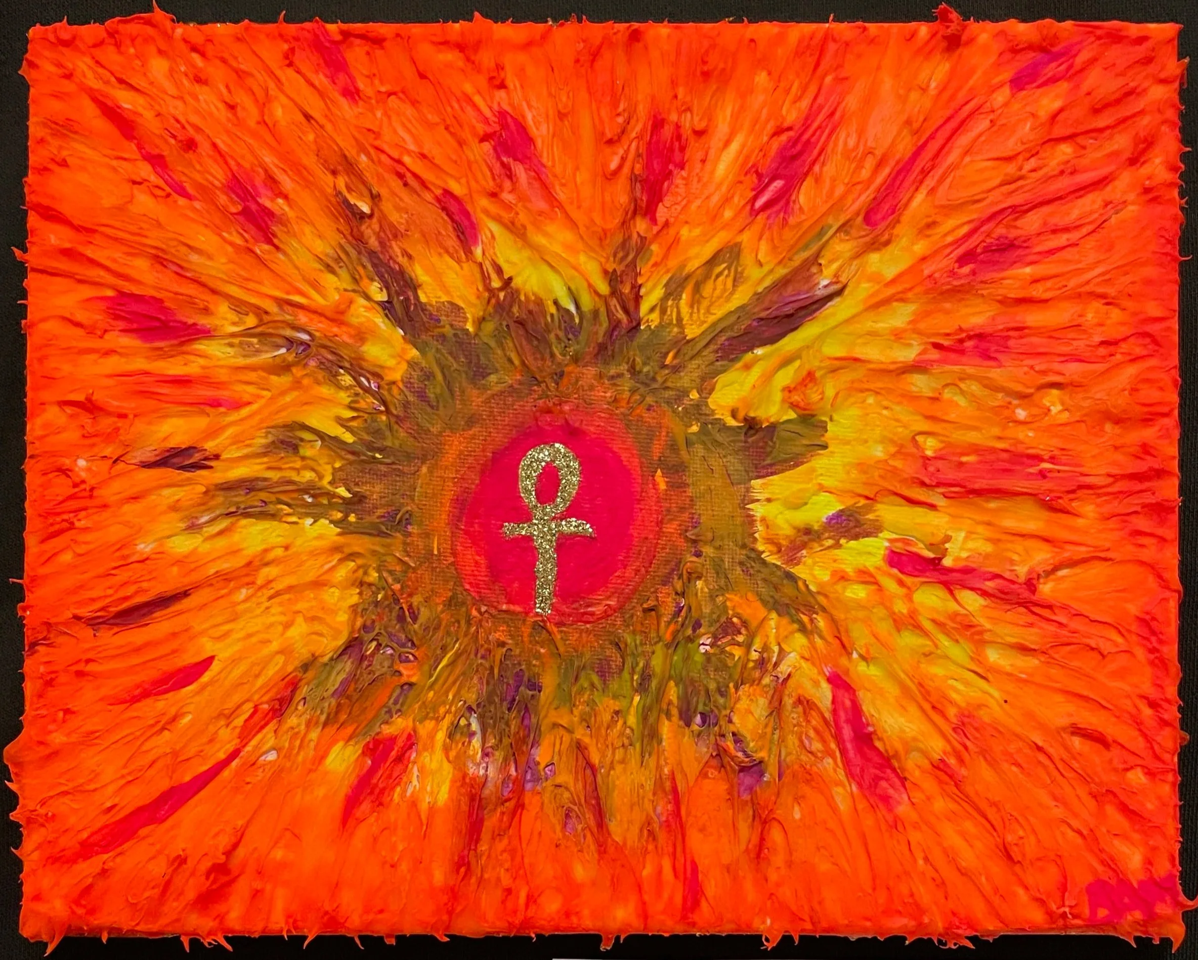 Sol's Soul - Devotional painting illuminated under blacklight, showing a central glittery gold ankh set inside a circular red area. Surrounding the circle is a burst of fiery colors including orange, red, yellow, and purple, radiating outward in a fl