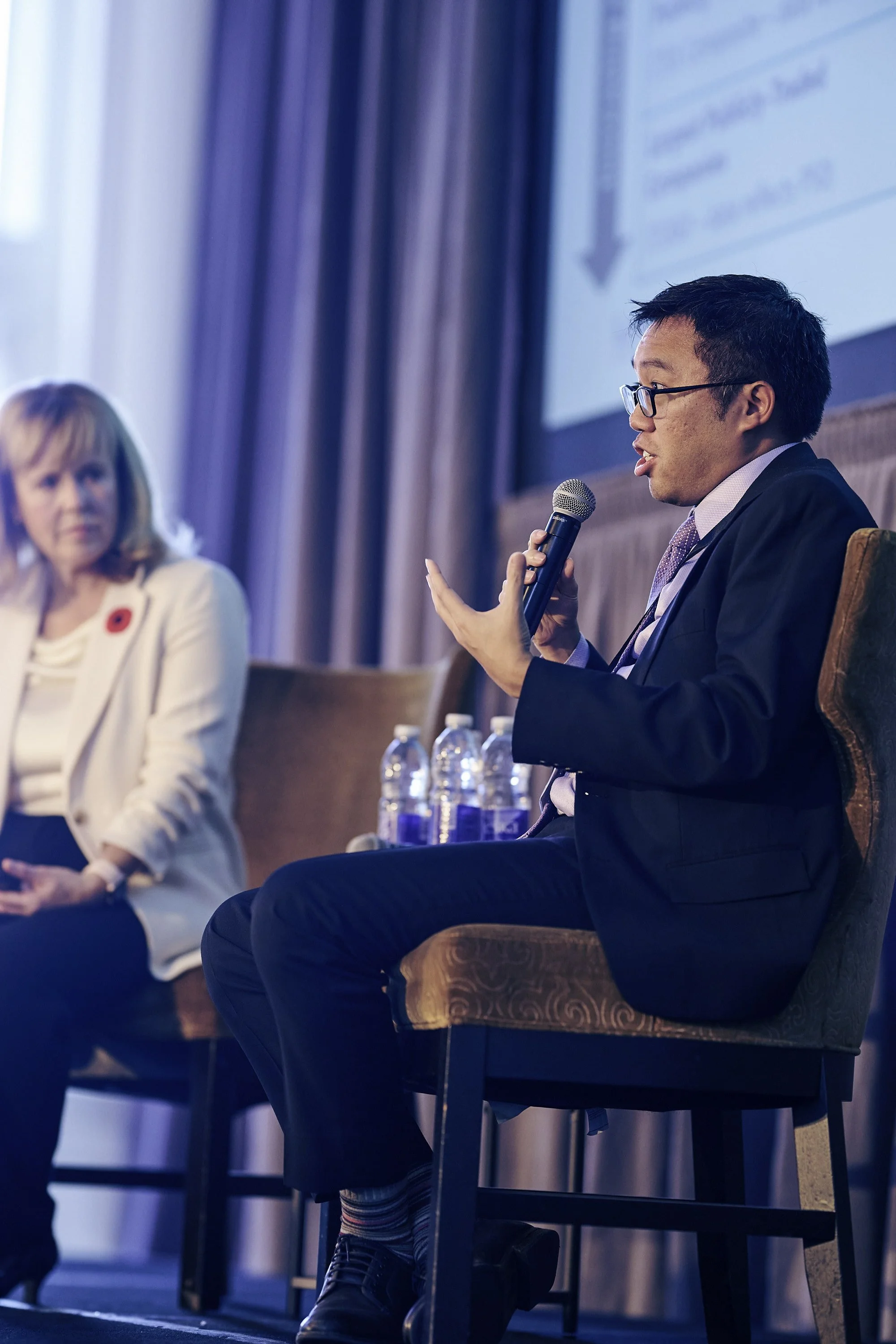Panel discussion at 2025 Canada’s Best Private Boards Summit and Awards with speakers on stage addressing an executive audience.