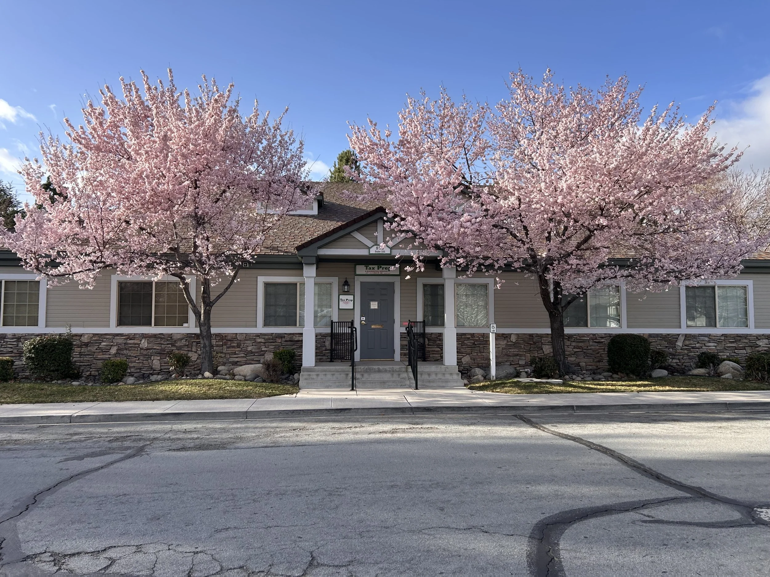Tax Prep & Bookkeeping Services Office photo taken in spring with pink blossomed trees