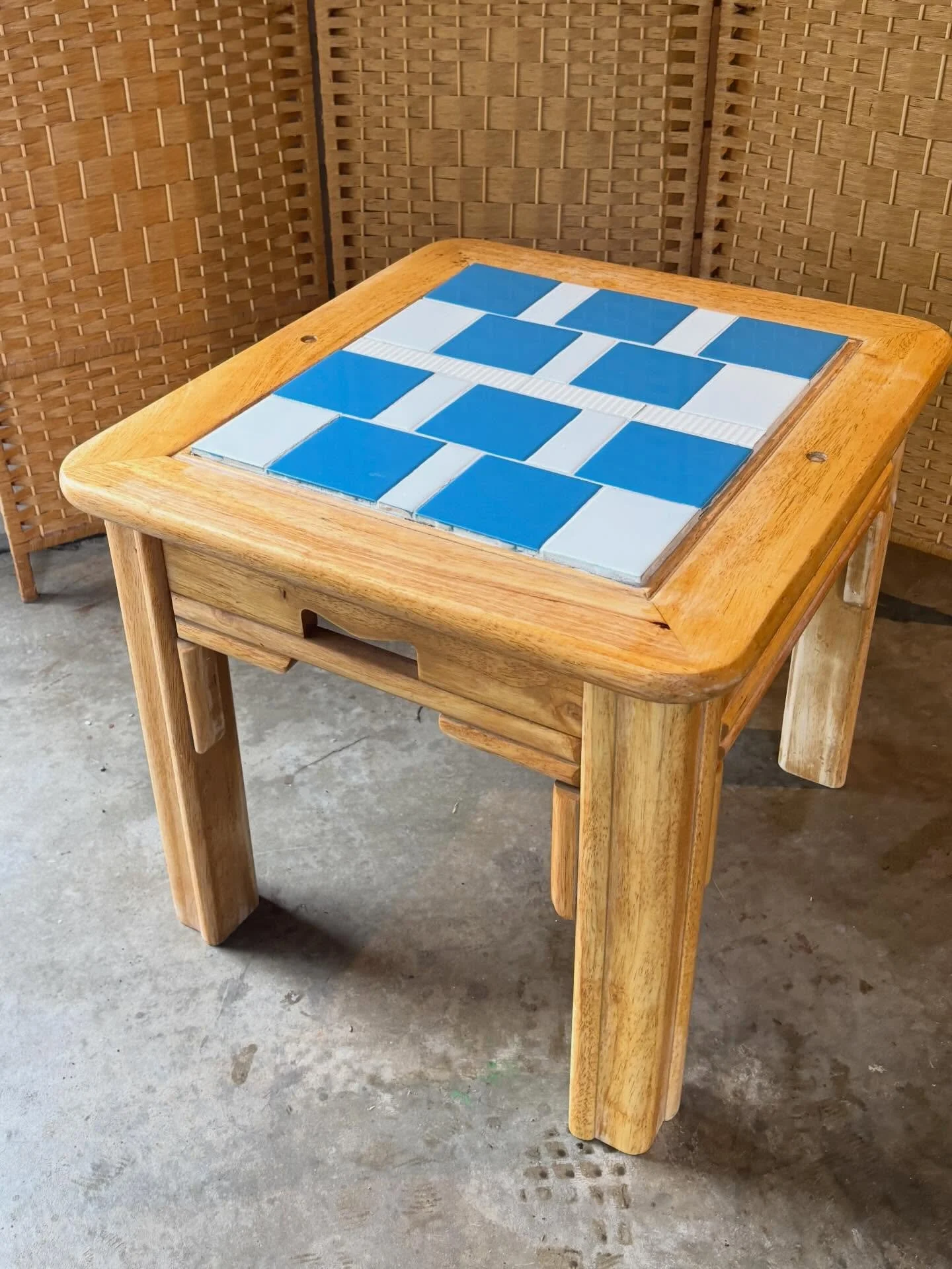 *SOLD* 70/80s Refurbished Vintage Tile Table

The full glow-up: 
✨ Wood table sanded, stained, &amp; sealed 
✨ Mexican-made blue &amp; white ceramic tiles
✨Reinforced with both a wood board &amp; cement board for long-term durability

Keep swiping to