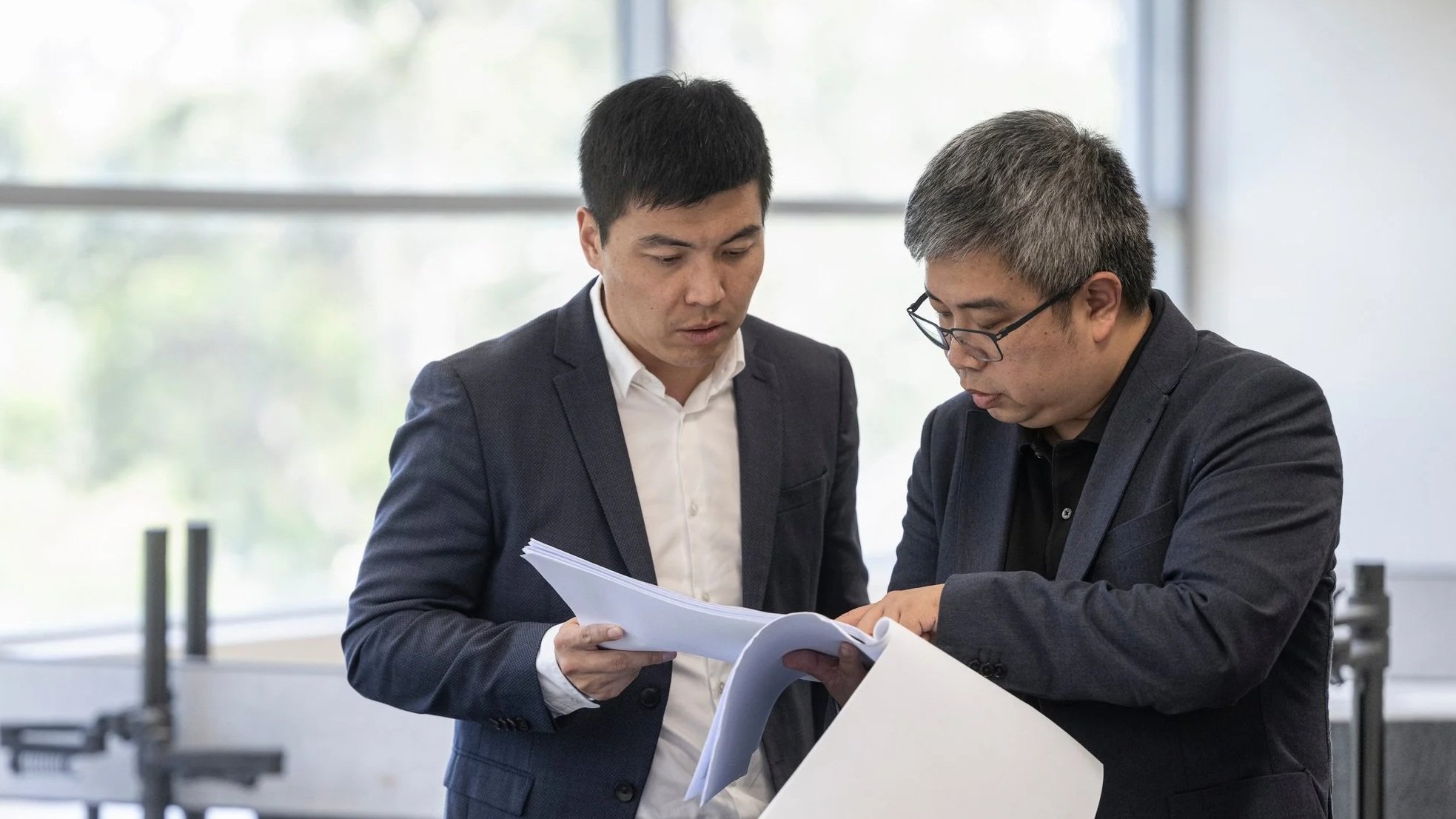 Harvestland Construction Directors, John He and Tony Zhang